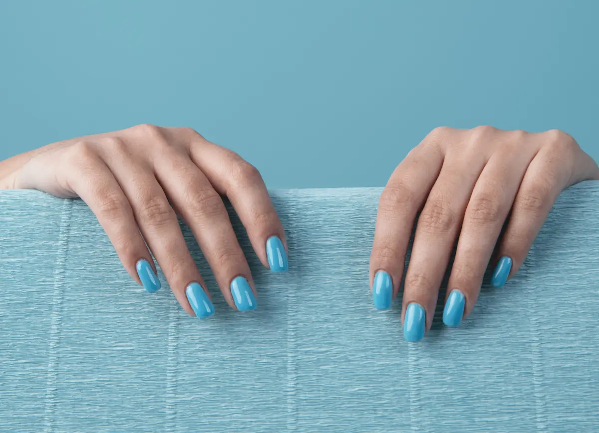 Coffin-shaped acrylic nails in matte nude shade