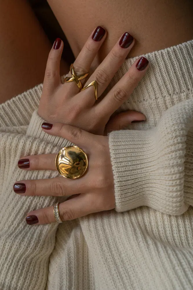 Glossy deep burgundy fall nails in almond shape